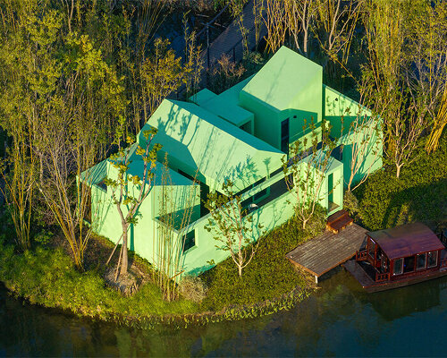 pure green cabin retreat by wiki world floats on secluded islet in chinese lake