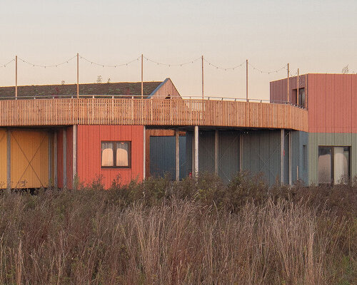 julius taminiau architects composes startup village in germany of colorful wooden modules