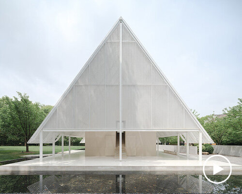 wing-like roof covers open gathering area by SHISUO in shanghai's memorial park