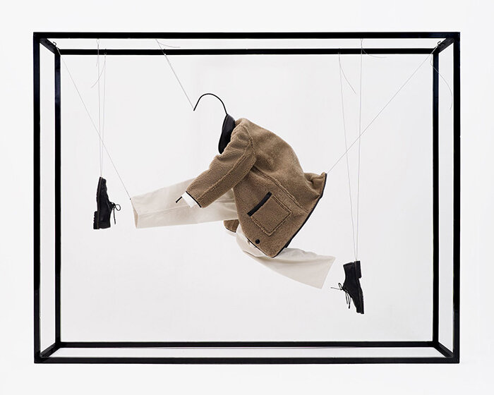 artist arran gregory creates invisible and floating wireframe figures for YMC clothing brand