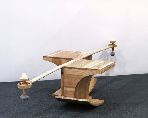 halfway serious wooden chair transforms sitting into a performative act of balance