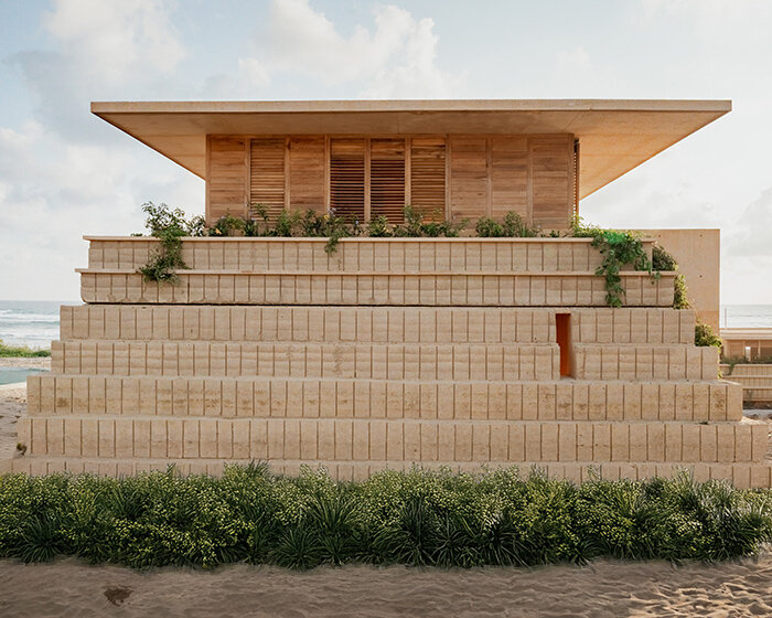 kymaia hotel's sandy, stepping suites emerge from coast of puerto escondido, mexico