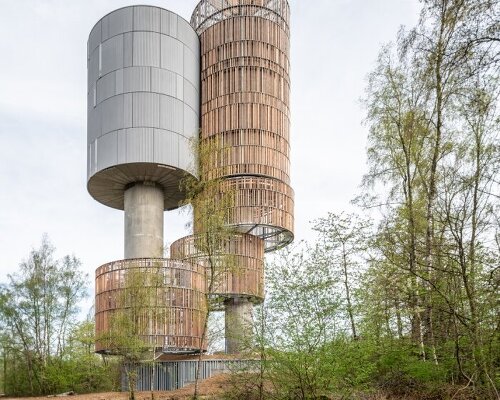 wood and cork towers create water reservoir and wildlife shelter in luxembourg forest