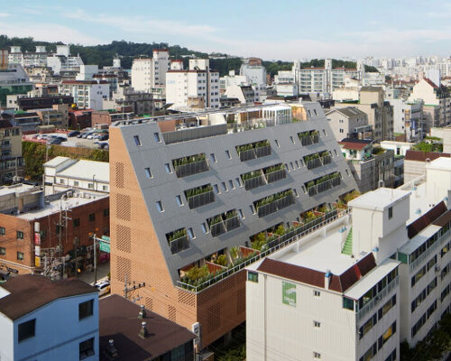 light-filtering brick facade wraps postpartum care center in seoul