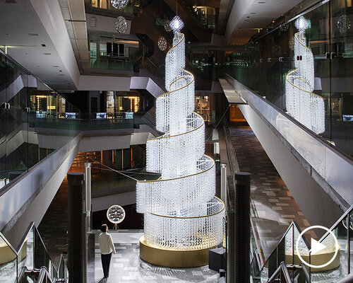 spiral christmas tree by yuji okitsu illuminates tadao ando's japanese commercial complex