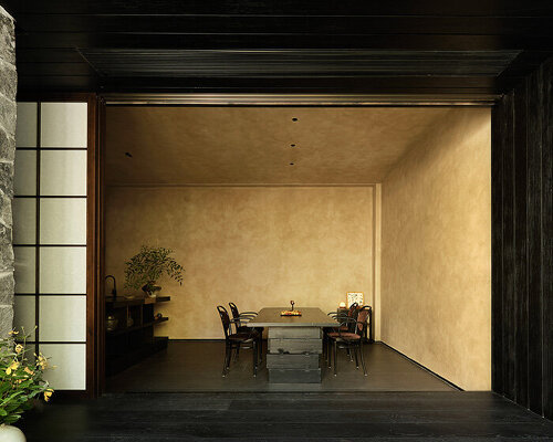 tea house by qicang design embraces seasonal rhythms behind sliding doors in china