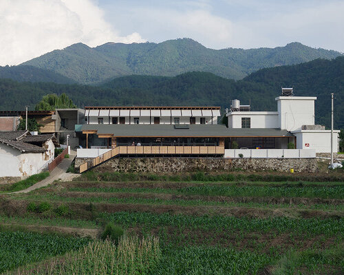 wooden frames by CLAB architects interlock with historic ruins in chinese community center