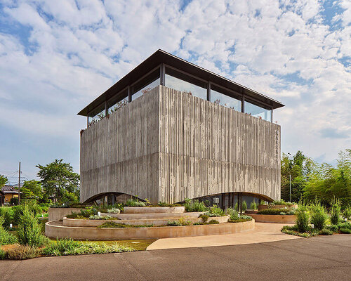 gin distillery in japan appears to float with arched openings by EA research and design office