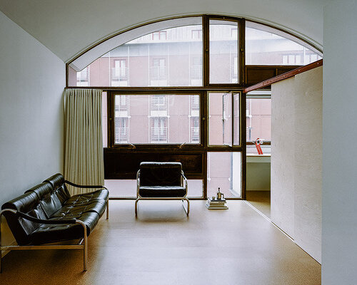 vaulted, 1960s-era 'crescent house' apartment sees retrofit by english studio TYPE