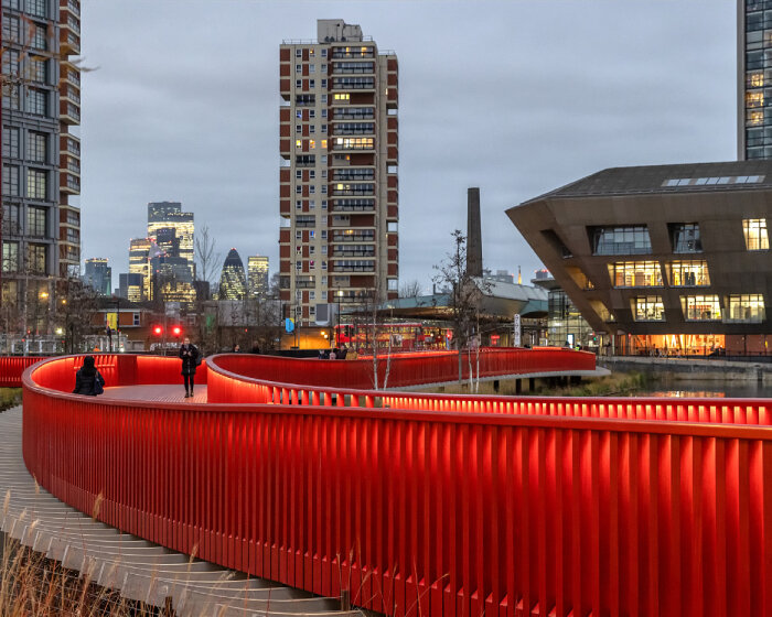 danica o. kus captures evocative red of asif khan's canada water boardwalk in london