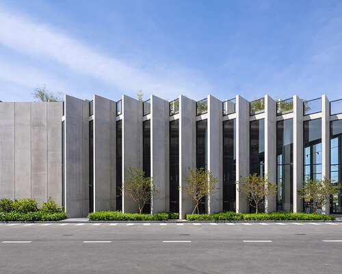 concrete louvres wrap this factory in vietnam, designed by baumschlager eberle architekten