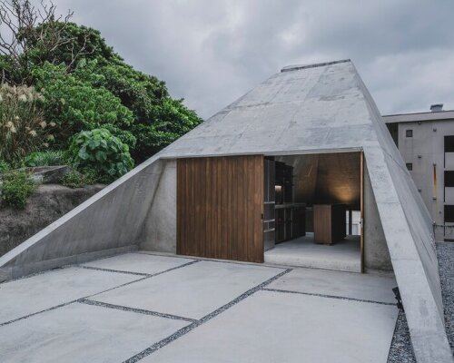 IGArchitects' pyramid hut residence echoes concrete tombs in japan with monolithic form