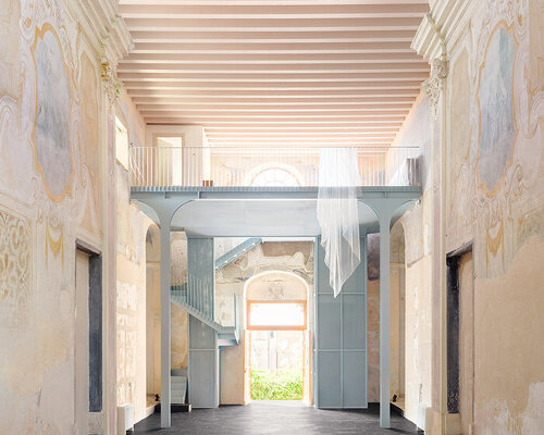 light blue steel structure by caarpa transforms historic italian church into event hall