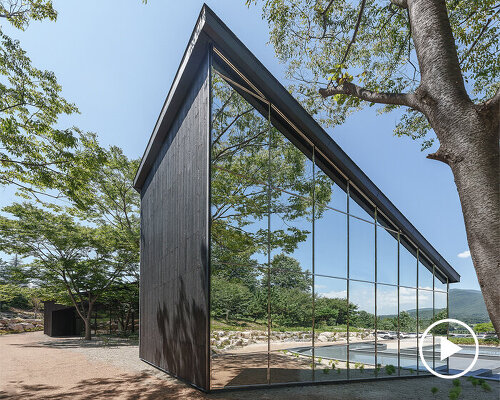 mirrored facades of 'tan-mok-won' korean bakery dissolve into healing landscape