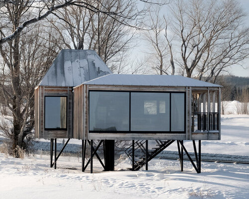 modular residence by delordinaire balances on stilts to preserve natural terrain in quebec