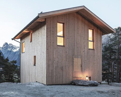 reiulf ramstad perches six tiny cabins among 'mountaineering capital of norway'