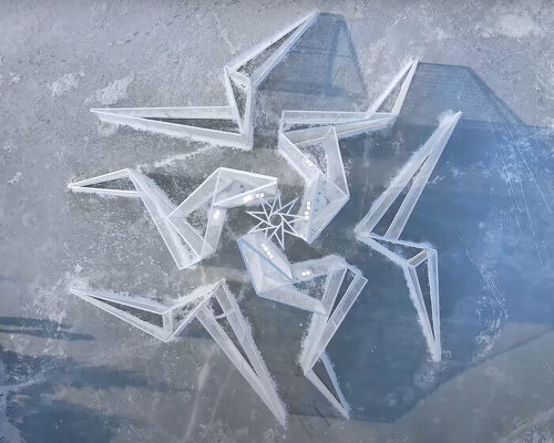 white flame installation's sharp geometry resembles ice crystals along lake in china