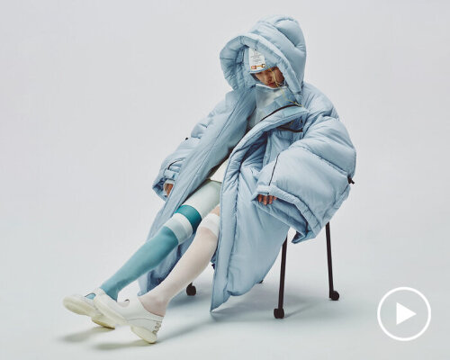 ZZZN coat doubles as sleeping bag with headpiece and red light so users doze off anywhere