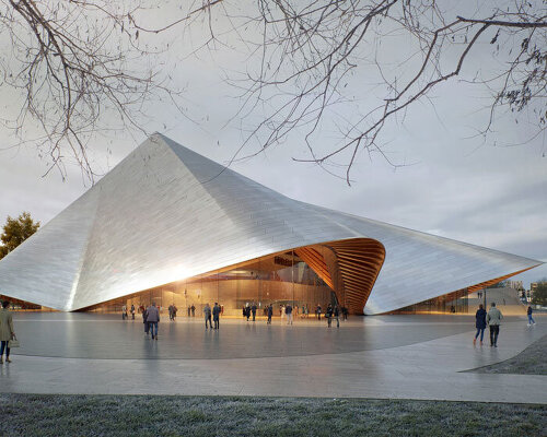 bjarke ingels group drapes undulating roof over opera and ballet theater of kosovo