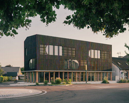 dark shousugiban wood facade wraps guillaume ramillien's creative hub in rural france