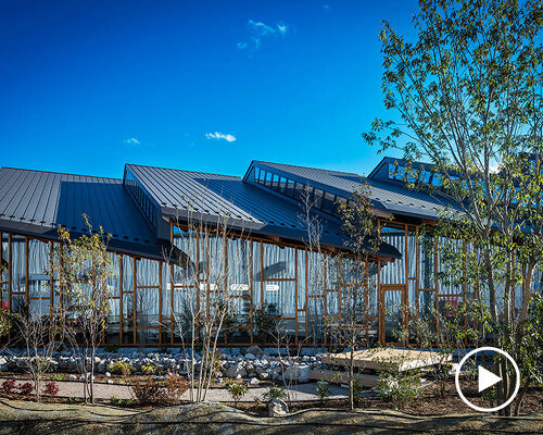 seven overlapping gabled roofs spread over haruna innovation center in japan