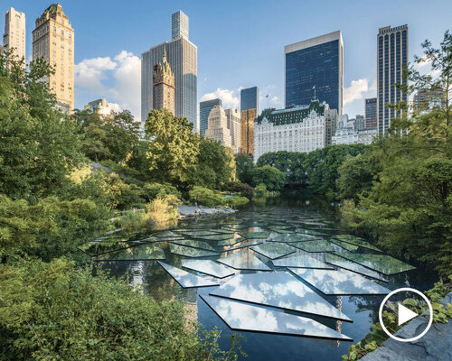 mirroring steel shards by gregory orekhov float across central park's water surface